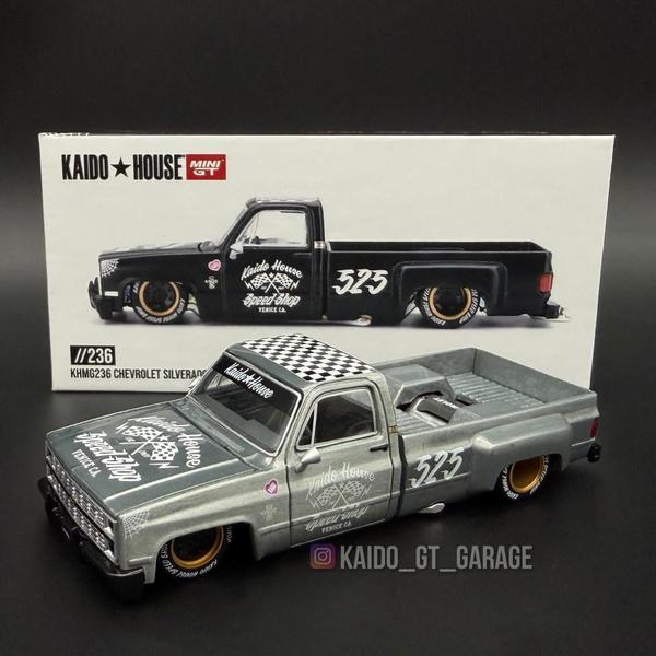 The Ch of the Chevrolet Silverado Dually Hot Rod 1/64 Diecast Car by Kaido House