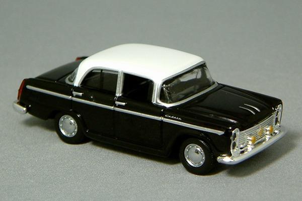 Picture of a Nissan Cedric by diecast car manufacturer Tomytec Tomica Limited Vintage